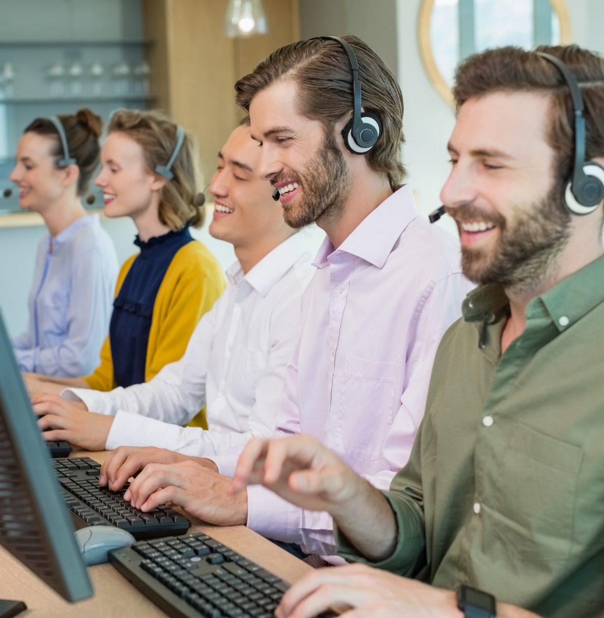 customer-service-executives-working-in-call-center.jpg